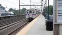 A SEPTA train approaches a station. A SEPTA train approaches a station.