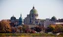The Pennsylvania Capitol in Harrisburg is seen in fall.