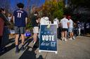 People wait in line to vote Nov. 5, 2024, at the Banana Factory in Bethlehem, Pennsylvania. People wait in line to vote Nov. 5, 2024, at the Banana Factory in Bethlehem, Pennsylvania.