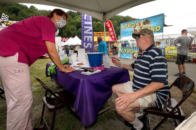 The state is launching initiatives to urge Pennsylvanians to get vaccinated, including setting up vaccine booths at county fairs.