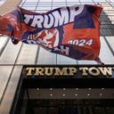 A Trump 2024 flag is raised outside of Trump Tower on July 14, 2024, in New York.