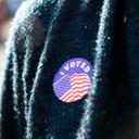 A Pennsylvania voter in Camp Hill wears an I Voted sticker on Election Day, Nov. 8, 2022.