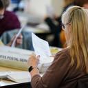 Workers sort mail ballots on primary Election Day 2024 at Northampton County Courthouse in Easton, Pennsylvania.