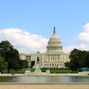 A summer view of the Capitol Reflecting Pool, Grant Memorial, and U.S. Capitol Building.