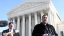 Citizens United President David Bossie (right) meets with reporters outside the U.S. Supreme Court. Citizens United President David Bossie (right) meets with reporters outside the U.S. Supreme Court.