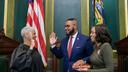 Austin Davis (center) is sworn in as lieutenant governor flanked by his wife Blayre Holmes Davis (right).