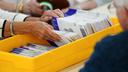 Workers sort mail ballots on primary Election Day 2024 at Northampton County Courthouse in Easton, Pennsylvania.