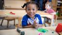 A child sits at a table at an early learning center in Pittsburgh.