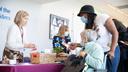 Women speak at a 2023 senior health fair in Moosic, Pennsylvania.