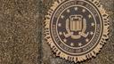 The seal on the J. Edgar Hoover FBI Building is seen June 9, 2023, in Washington.