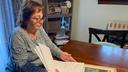 Cyndi Compton looks through papers in her Tioga County home. Cyndi Compton looks through papers in her Tioga County home.