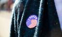 A Pennsylvania voter in Camp Hill wears an I Voted sticker on Election Day, Nov. 8, 2022.