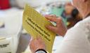 Workers sort mail ballots on primary Election Day 2024 at Northampton County Courthouse in Easton, Pennsylvania.