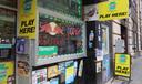 A convenience store in Downtown Pittsburgh prominently advertises that Pennsylvania Lottery tickets are available.