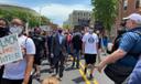 Gov. Tom Wolf marches with demonstrators in Harrisburg on June 3, 2020.