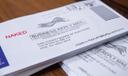 "Naked" ballots are stacked and sorted inside a secure facility within the Erie County Courthouse.