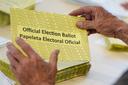 Workers sort mail ballots on primary Election Day 2024 at Northampton County Courthouse in Easton, Pennsylvania.