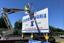 A Pennsylvania highway sign with new branding matching that of the commonwealth's new contested license plate.