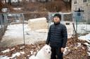 Ge Fangyuan, a farmer in Washington Township, stands with his dog for a portrait at the farm Feb. 20, 2026. Fangyuan's farm was disrupted after a sewer main break dumped about 8,000 gallons of raw sewage in November 2024. Ge Fangyuan, a farmer in Washington Township, stands with his dog for a portrait at the farm Feb. 20, 2026. Fangyuan's farm was disrupted after a sewer main break dumped about 8,000 gallons of raw sewage in November 2024.