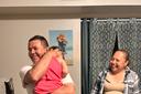 Erasmo Zavala hugs his granddaughter, Selene, as his wife Maria stands nearby. A picture of Selene’s mother, Selena, who was murdered, hangs behind the family. May 29, 2026. Erasmo Zavala hugs his granddaughter, Selene, as his wife Maria stands nearby. A picture of Selene’s mother, Selena, who was murdered, hangs behind the family. May 29, 2026.