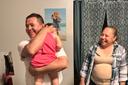 Erasmo Zavala hugs his granddaughter, Selene, as his wife Maria stands nearby. A picture of Selene’s mother, Selena, who was murdered, hangs behind the family. May 29, 2026. Erasmo Zavala hugs his granddaughter, Selene, as his wife Maria stands nearby. A picture of Selene’s mother, Selena, who was murdered, hangs behind the family. May 29, 2026.