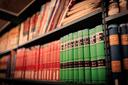 Library books arranged on a shelf Library books arranged on a shelf