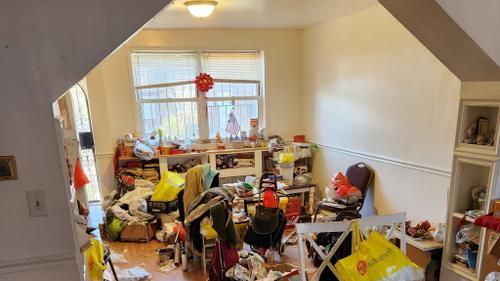 At Luen Ng's Northeast Philadelphia home, a caseworker observed trash on the floor, rotten food on tables, and infestations.