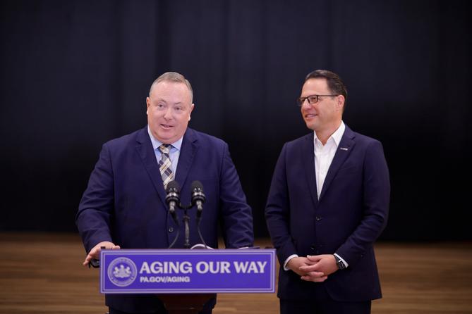 Pennsylvania Secretary of Aging Jason Kavulich (left) and Gov. Josh Shapiro (right)