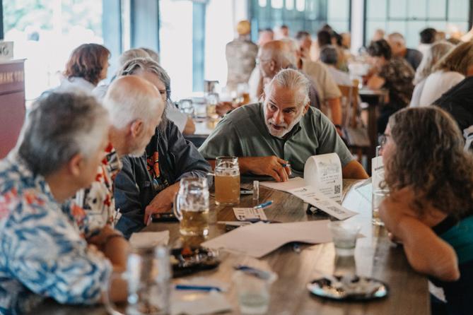 The crowd at Spotlight PA’s "Clink and Think" Quiz Bash Fundraiser on Sept. 15, 2024, at Axemann Brewery in Bellefonte, PA.