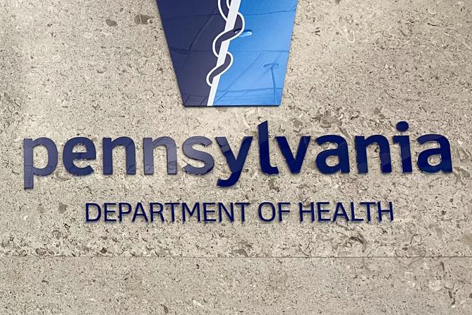 Pennsylvania Department of Health logo on the outside of its main building.