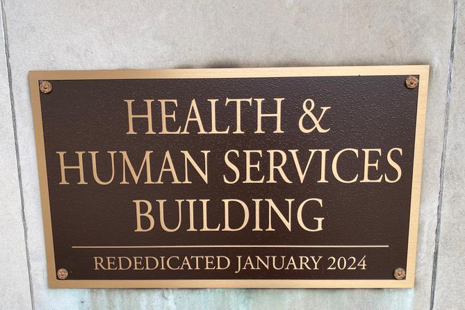 Sign identifying the Health & Human Services Building in Harrisburg, Pa.