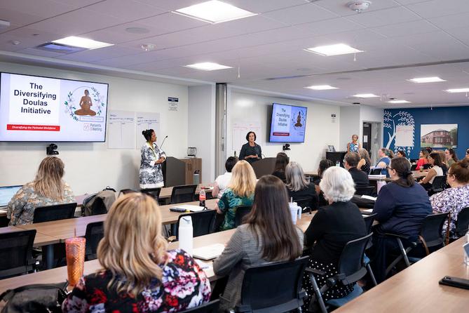 Doulas and health officials discuss how to improve maternal health care at an August 2024 event.