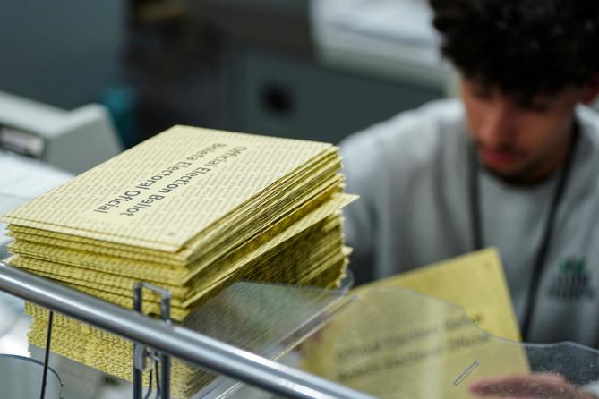 Lehigh County voter registration workers sort mail ballots Nov. 5, 2024.