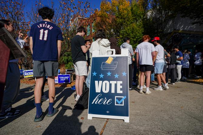 People wait in line to vote Nov. 5, 2024, at the Banana Factory in Bethlehem, Northampton County, Pennsylvania.