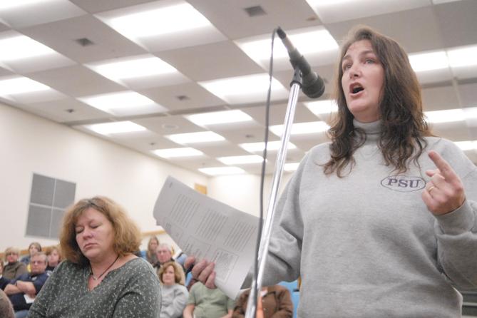 Pamela Hackenburg, right, at a Mifflinburg Area School Board meeting in 2011.