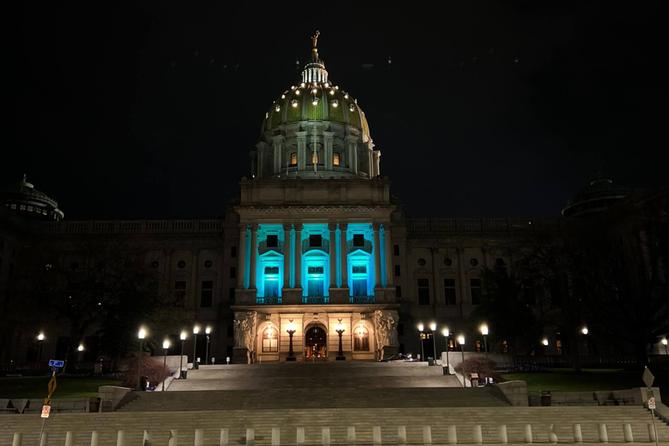 The Pennsylvania Capitol building illuminated in teal for Sexual Assault Awareness Month. The Pennsylvania Capitol building illuminated in teal for Sexual Assault Awareness Month.