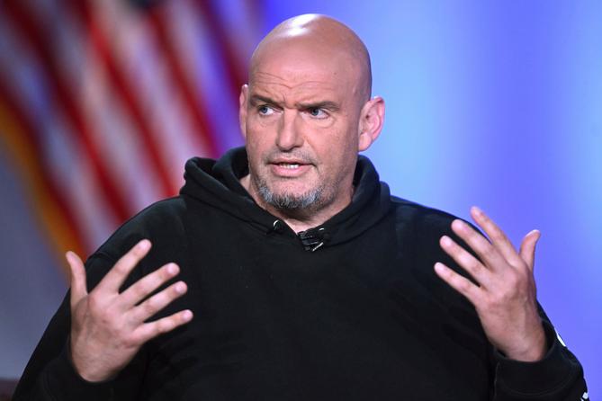 John Fetterman participates in a debate in Boston in 2025. John Fetterman participates in a debate in Boston in 2025.