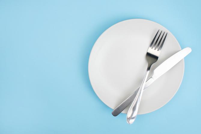 A stock image of a plate, fork, and knife. A stock image of a plate, fork, and knife.