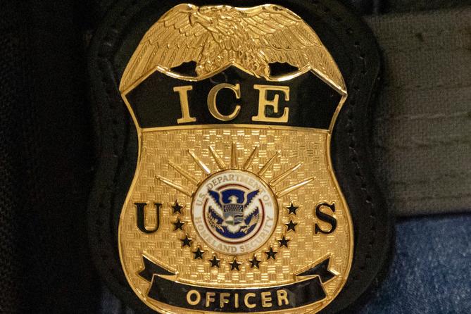 A federal agent wears an Immigration and Customs Enforcement badge in New York, June 10, 2025. A federal agent wears an Immigration and Customs Enforcement badge in New York, June 10, 2025.