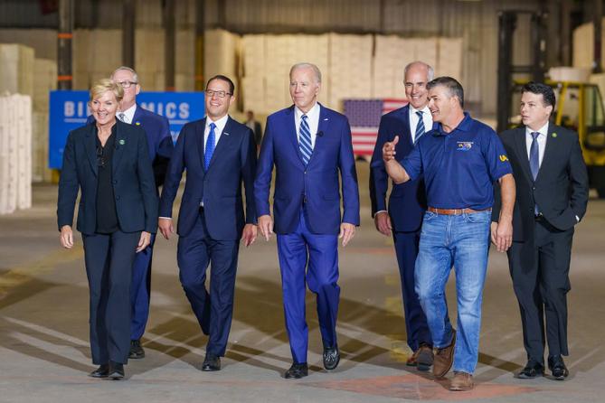 Gov. Josh Shapiro with President Joe Biden (center) at Tioga Marine Terminal in Philadelphia, Pennsylvania.