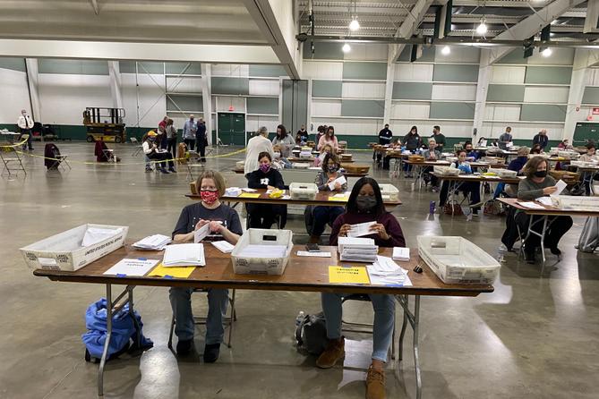 About 100 county employees processed mail-in ballots at the York Fairgrounds on Tuesday.