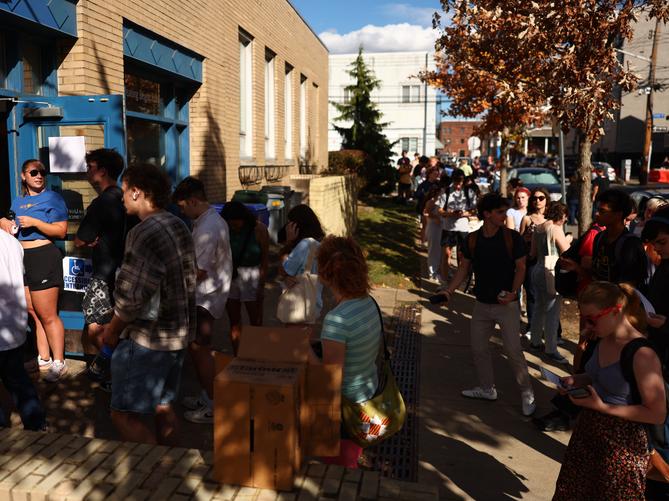 College students wait in line, with some claiming longer than an hour and a half, at the Oakland Career Center near the University of Pittsburgh on Nov. 5, 2024 in Pittsburgh, PA.